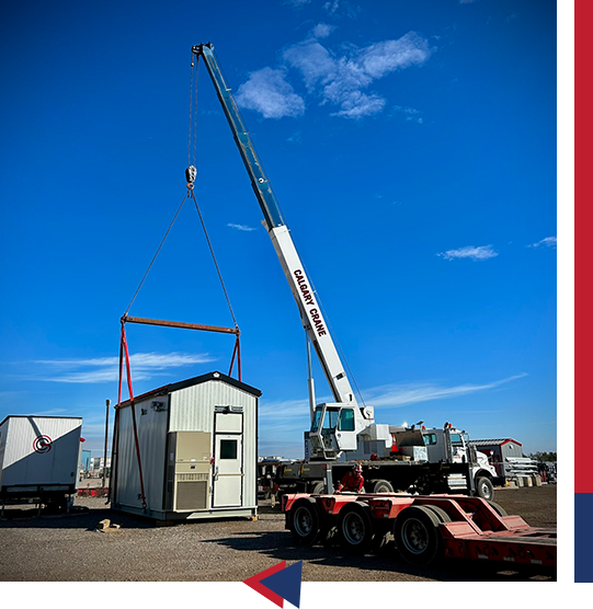 A crane is being used to lift a trailer.